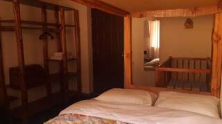 Гостевой дом LerMont Guest House Lermontovo Семейный номер с видом на сад-5